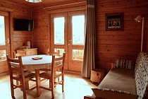 Les Chalets des Marmottes - tv in woonkamer en zitbank